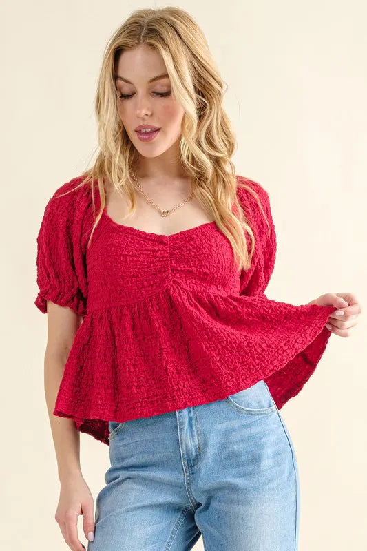 And The Why Lovely Textured and Smocked Top in Red